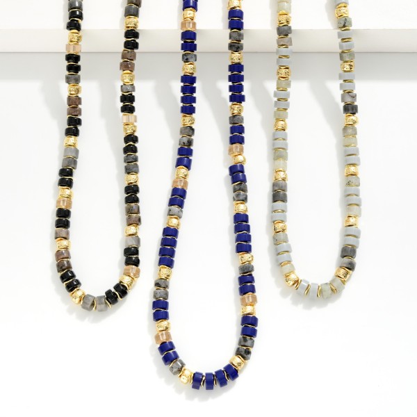 Semi Precious Stone Beaded Necklace Featuring Metal Tone Accents 

- Approximately 14" L
- Extender 3" L

