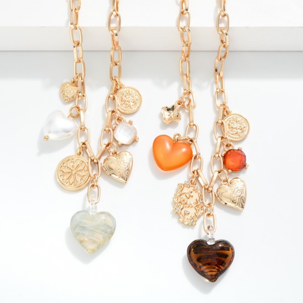 Chain Link Necklace Charm Necklace Featuring Metal Tones & Acetate Heart Charms 

- Approximately 16" L
- Extender 3" L