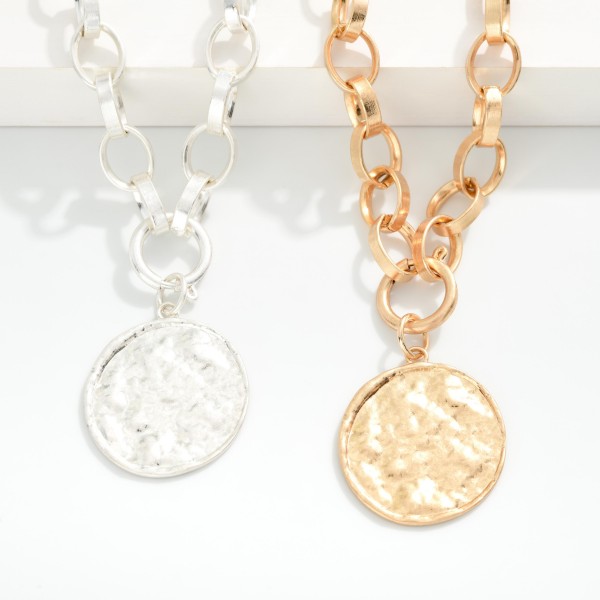 Chain Link Necklace Featuring Metal Tone Coin Pendant 

- Approximately 18" L 