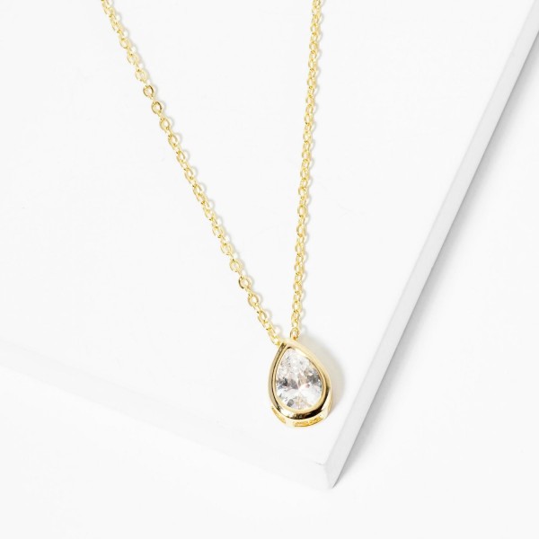 Dainty Chain Link Necklace Featuring Cubic Zirconia Teardrop Pendant 

- Gold Dipped
- Approximately 15.5" L
- Extender 2" L