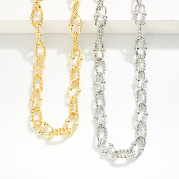 Chain Link Necklace With Twisted Link Detail 

- Gold Dipped
- Approximately 18" L
- Extender 1" L