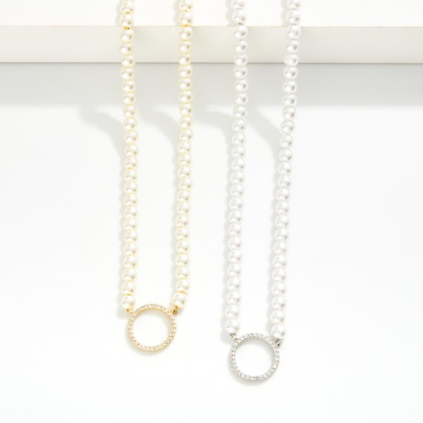 Pearl Beaded Necklace Featuring Cubic Zirconia Studded Hoop Pendant 

- Gold Dipped 
- Approximately 16" L
- Extender 1.5" L