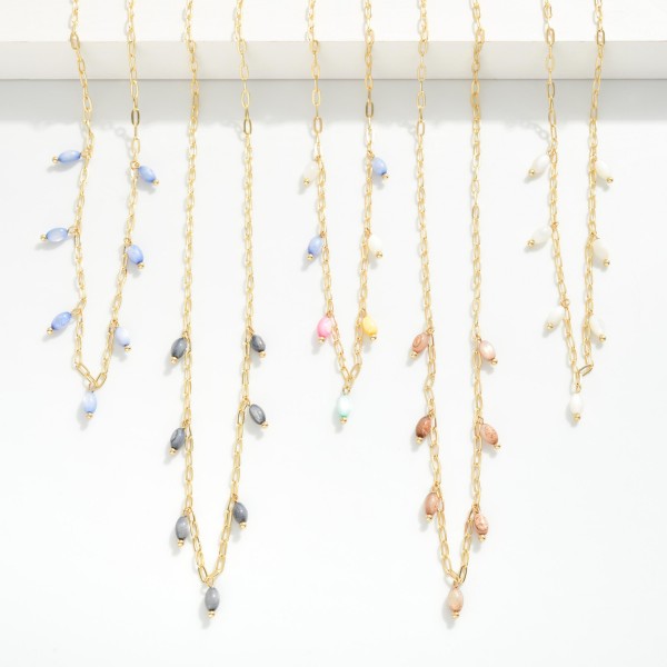 Chain Link Necklace Featuring Bead Charm Details 

- Approximately 16" L
- Extender 3" L