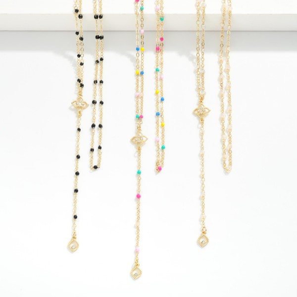 Layered Chain Link Y Necklace Featuring Painted Metal Link Stations & Clover Detail 

- Approximately 16" L
- Extender 3" L