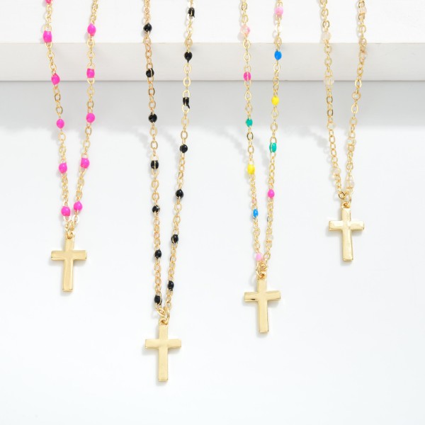 Chain Link Necklace Featuring Painted Link Details & Metal Tone Cross Pendant 
- Approximately 14" L
- Extender 3" L