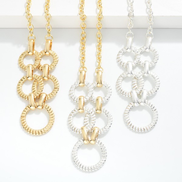 Chain Link Necklace Featuring Linked Textured Metal Hoops 

- Approximately 16" L
- Extender 3" L 