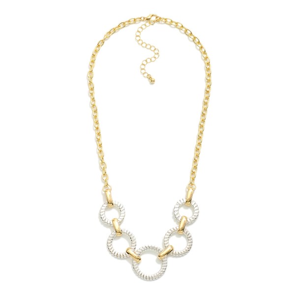 Chain Link Necklace Featuring Linked Textured Metal Hoops 

- Approximately 16" L
- Extender 3" L 