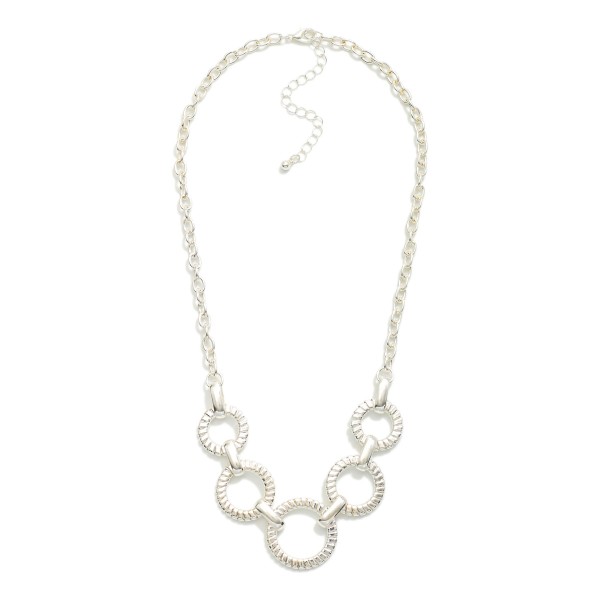 Chain Link Necklace Featuring Linked Textured Metal Hoops 

- Approximately 16" L
- Extender 3" L 