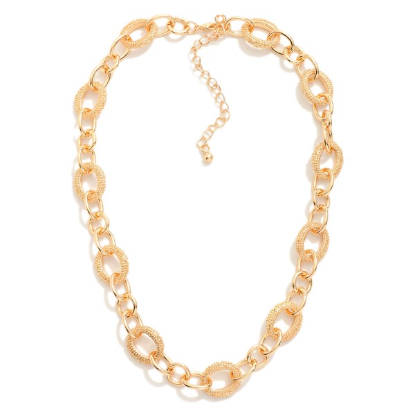 Chain Link Necklace Featuring Linked Textured Metal Oval 

- Approximately 16" L 
- Extender 3" L 
