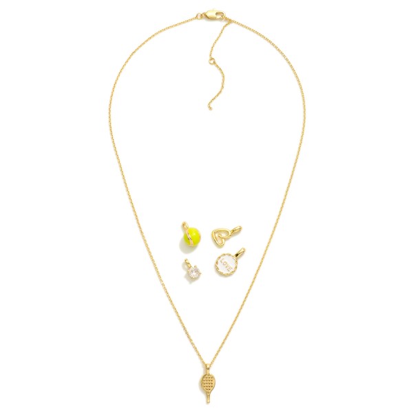Chain Link Necklace Featuring Interchangeable Pendant 

- Includes: Tennis Ball & Racket, Love, Heart, & Cubic Zirconia 
- Approximately 16" L
- Extender 2" L 