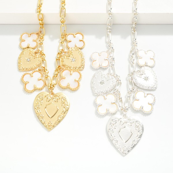Chain Link Necklace Featuring Chunky Pearlescent Clovers & Heart Charms 

- Approximately 18" L
- Extender 3" L