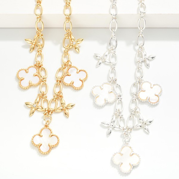 Chain Link Charm Necklace Featuring Pearlescent Clovers & Star Charms 

- Approximately 18" L
- Extender 3" L