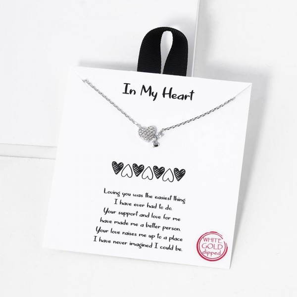 Dainty Chain Link Necklace Featuring Cubic Zirconia Heart & Linked Metal Tone Heart Pendant 				
					
- Approximately 16" L					
- Extender 2" L					
- Hypoallergenic Brass Base					
- 18K Gold Dipped					
- Card: "Loving you was the easiest thing I have ever had to do. Your support and love for me have made me a better person. Your love raises me up to a place I have never imagined I could be."					