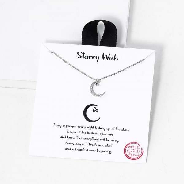 Dainty Chain Link Necklace Featuring Cubic Zirconia Crescent Moon & Star Pendant 						
						
- Approximately 16" L						
- Extender 2" L						
- Hypoallergenic Brass Base						
- 18K Gold Dipped						
- Card: "I say a prayer every night looking up at the stars. I look at the brilliant glimmers and know that everything will be okay. Every day is a fresh new start and a beautiful new beginning."						
