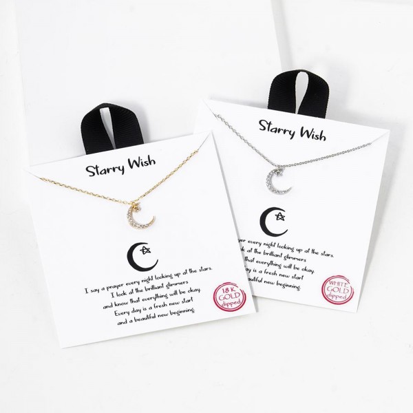 Dainty Chain Link Necklace Featuring Cubic Zirconia Crescent Moon & Star Pendant 						
						
- Approximately 16" L						
- Extender 2" L						
- Hypoallergenic Brass Base						
- 18K Gold Dipped						
- Card: "I say a prayer every night looking up at the stars. I look at the brilliant glimmers and know that everything will be okay. Every day is a fresh new start and a beautiful new beginning."						