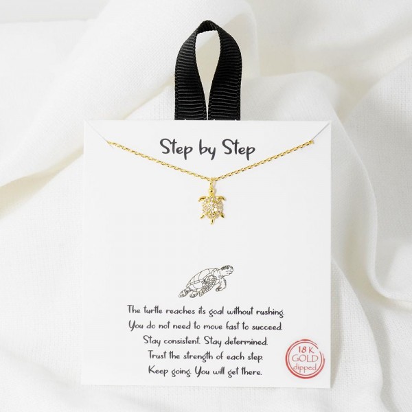 Dainty Chain Link Necklace Featuring Cubic Zirconia Sea Turtle Pendant 				
					
- Approximately 16" L					
- Extender 2" L					
- Hypoallergenic Brass Base					
- 18K Gold Dipped					
- Card: "The turtle reaches its goal without rushing. You do not need to move fast to succeed. Stay consistent. Stay determined. Trust the strength of each step. Keep going. You will get there."					