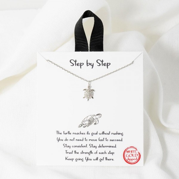 Dainty Chain Link Necklace Featuring Cubic Zirconia Sea Turtle Pendant 				
					
- Approximately 16" L					
- Extender 2" L					
- Hypoallergenic Brass Base					
- 18K Gold Dipped					
- Card: "The turtle reaches its goal without rushing. You do not need to move fast to succeed. Stay consistent. Stay determined. Trust the strength of each step. Keep going. You will get there."					