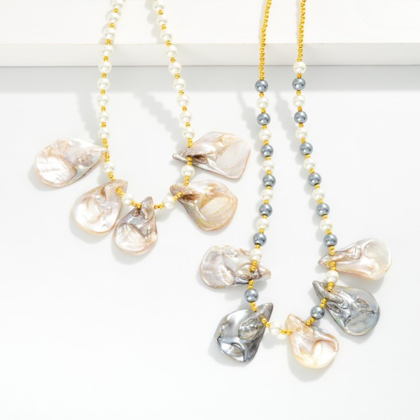 Shell, Pearl, & Metal Tone Bead Beaded Necklace 

- Approximately 14" L
- Extender 2" L