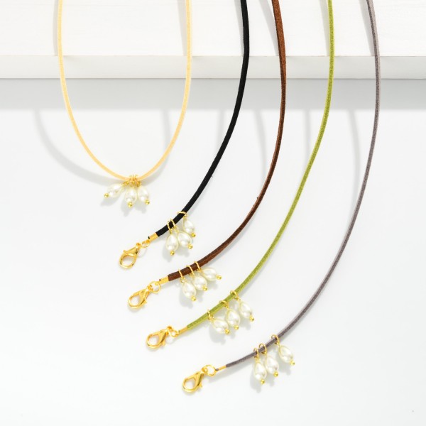 Leather Necklace Featuring Teardrop Pearl Pendants 

- Approximately 14" L
- Extender 2" L