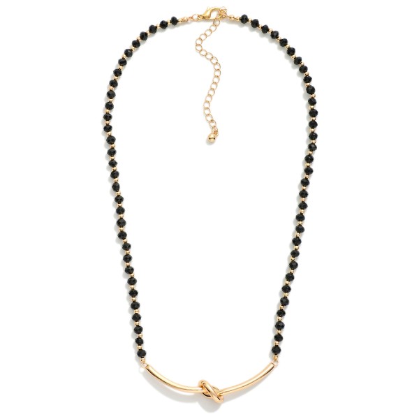 Faceted Bead Necklace Featuring Metal Tone Knotted Pendant 

- Approximately 16" L
- Extender 3" L