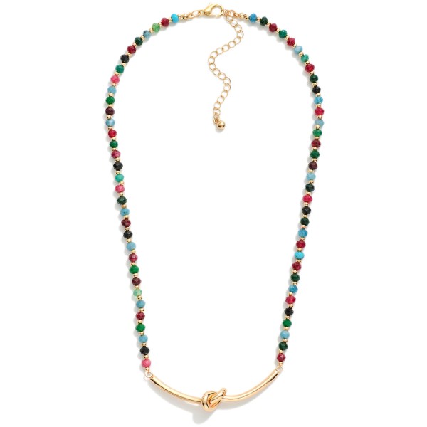 Faceted Bead Necklace Featuring Metal Tone Knotted Pendant 

- Approximately 16" L
- Extender 3" L