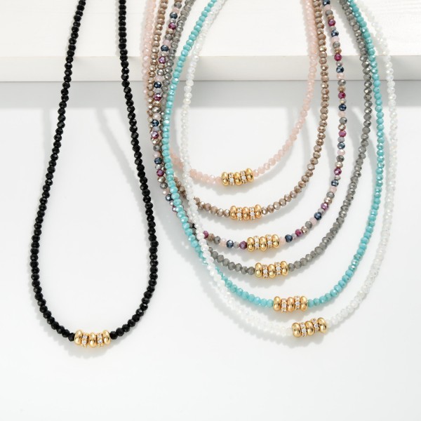 Faceted Bead Beaded Necklace Featuring Metal Tone & Rhinestone Disks 

- Approximately 16" L
- Extender 3" L