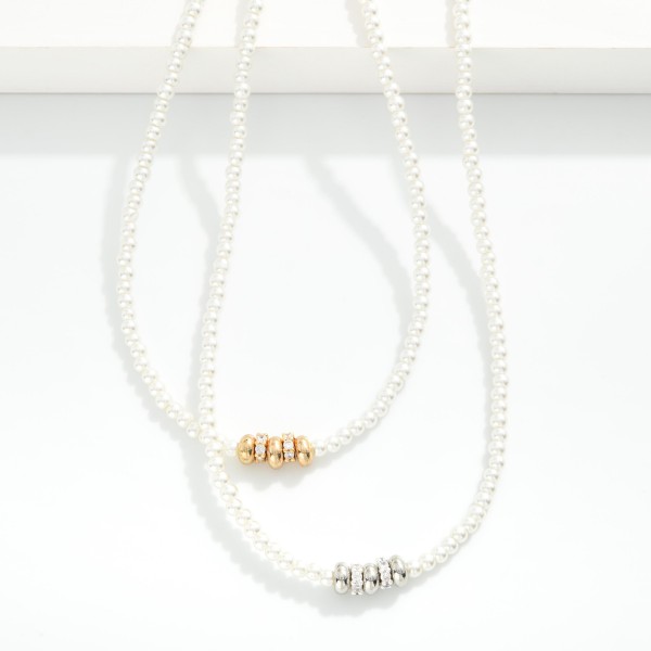 Pearl Beaded Necklace Featuring Disc Beads 

- Approximately 16" L 