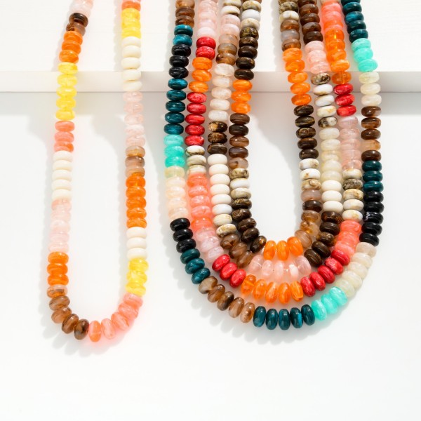 Marbled Acetate Stone Disk Beaded Necklace

- Approximately 16" L
