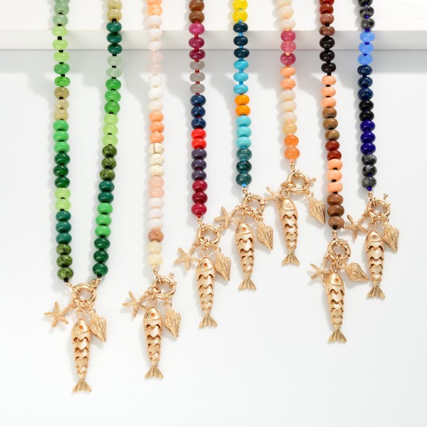 Rainbow Stone Beaded Necklace Featuring Metal Tone Fish & Sea Creatures Pendant 

- Approximately 16" L
- Extender 3" L