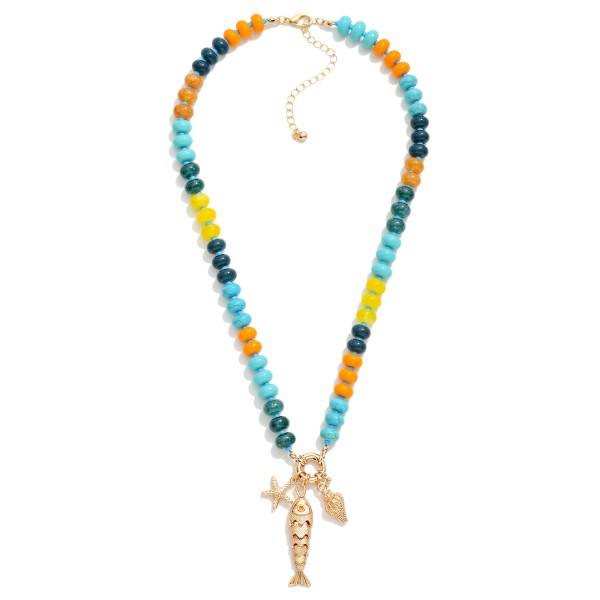 Rainbow Stone Beaded Necklace Featuring Metal Tone Fish & Sea Creatures Pendant 

- Approximately 16" L
- Extender 3" L