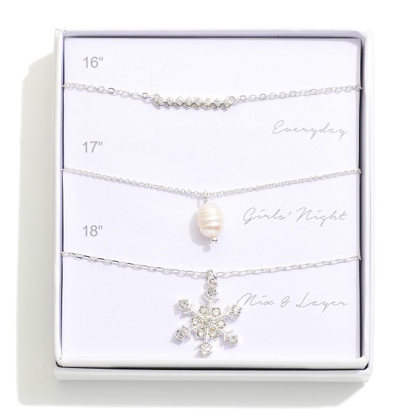 Set Of Three Chain Link Pendant Necklaces Featuring Snowflake, Rhinestones, & Pearl 

- Giftbox Included
- Approximately 16" L - 18" L