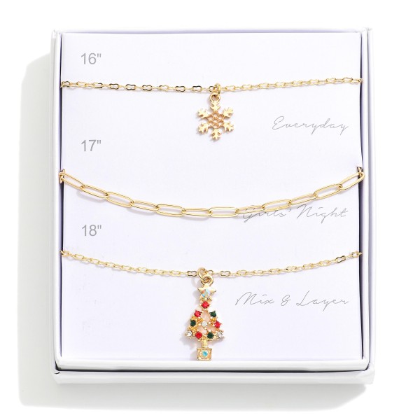 Set Of Three Chain Link Pendant Necklaces Featuring Rhinestone Snowflake & Christmas Tree

- Giftbox Included
- Approximately 16" L - 18" L