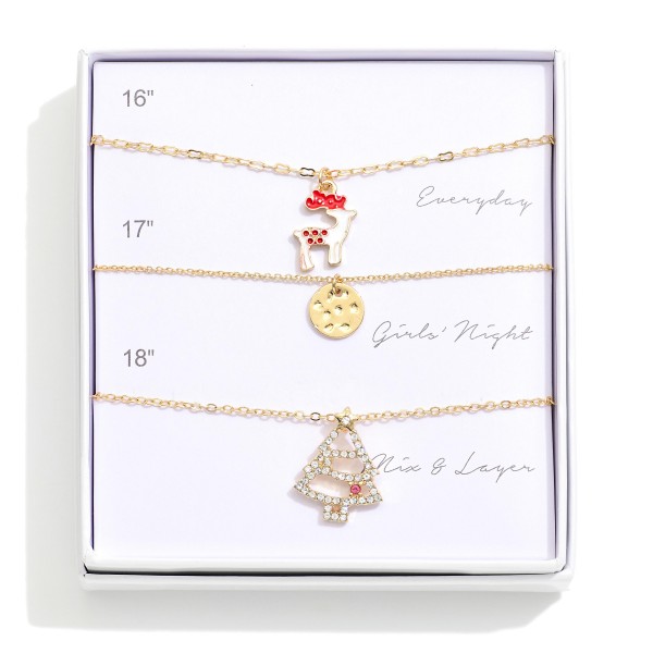 Set Of Three Chain Link Pendant Necklaces Featuring Reindeer & Christmas Tree
- Giftbox Included
- Approximately 16" L - 18" L