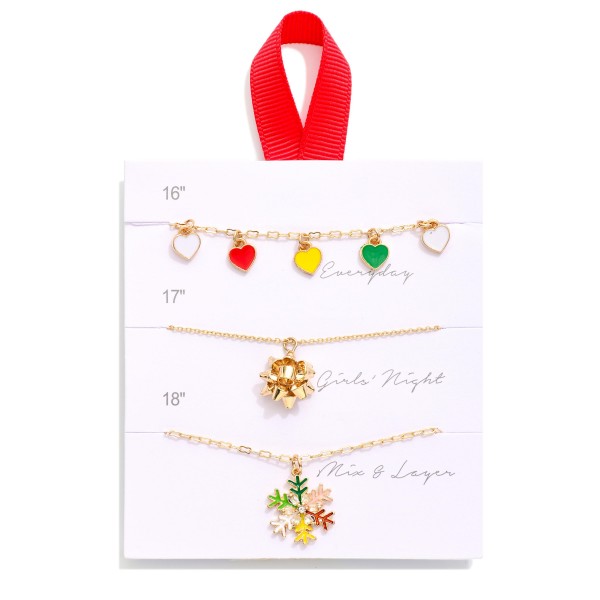 Set Of Three Chain Link Pendant Necklaces Featuring Rhinestones, Enamel Detailing & Gold Tones 
- Approximately 16" L - 18" L