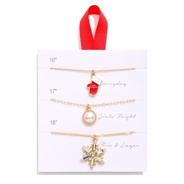 Set Of Three Chain Link Pendant Necklaces Featuring Rhinestone Snowflake, Pearl & Christmas Mitten
- Approximately 16" L - 18" L