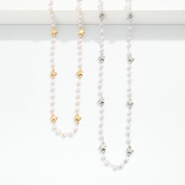 Chain Link Necklace Featuring Pearls & Metal Tone Star Stations 

- Approximately 16" L 