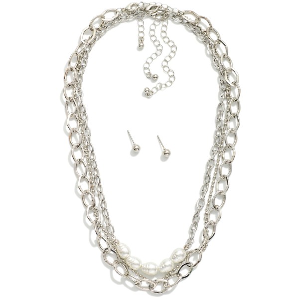 Layered Chain Link Necklace Featuring Pearl Details 
- Metal Tone Ball Studs Included 
- Approximately 14" L
- Extender 3" L