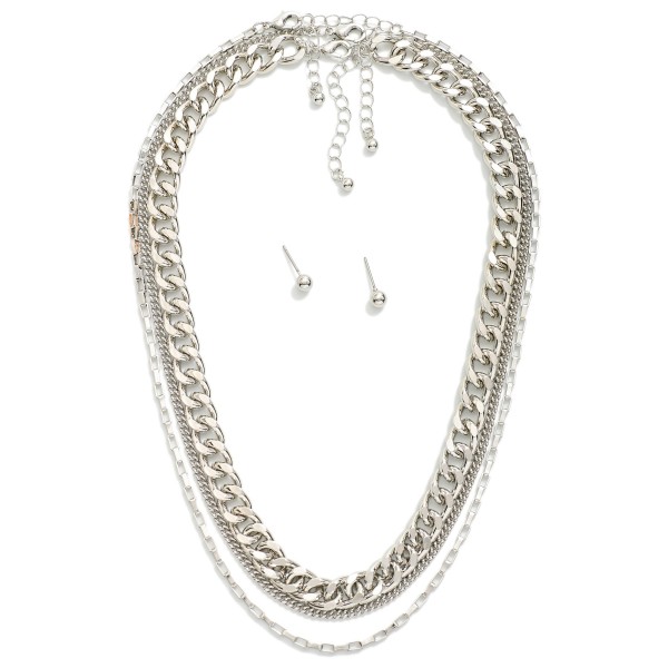 Layered Chain Link Necklace 
- Metal Tone Ball Studs Included 
- Approximately 16" L
- Extender 3" L