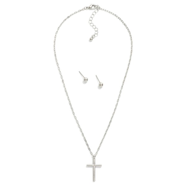Metal Tone Chain Link Necklace Featuring Cross Pendant 
- Approximately 18" L 
- Extender 2" L 
- Metal Tone Stud Earrings Included