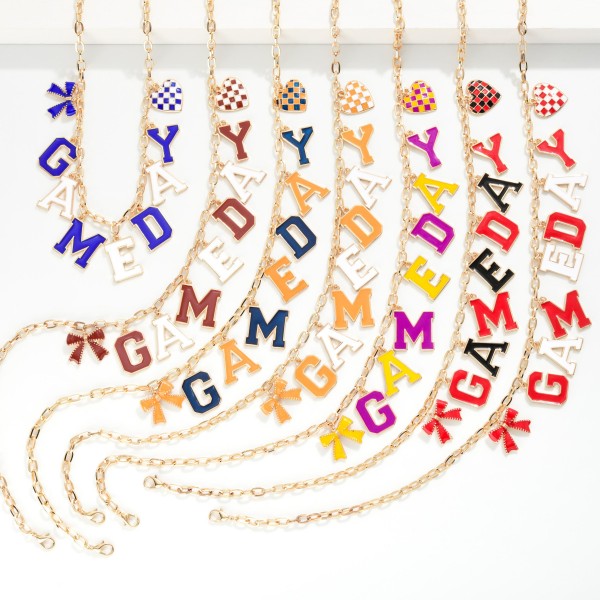 Chain Link Necklace Featuring "Game-day" Lettering Featuring Heart & Bow Pendant 

- Approximately 18" L 
- Extender 2" L 