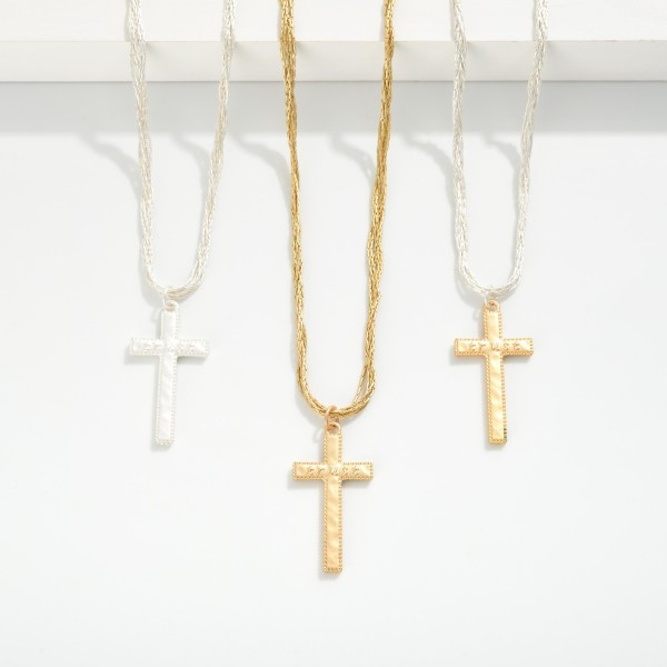 Intertwined Chain Link Featuring Cross Pendent With "TRUST" Engraved  
- Approximately 18" L