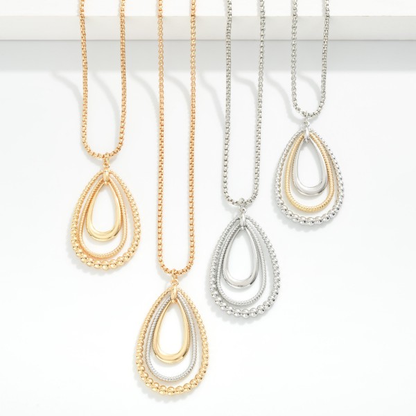 Snake Metal Tone Chain Necklace Featuring Teardrop Linked Hoop Beaded Detail Pendent 
- Approximately 20" L
- Extender 3" L