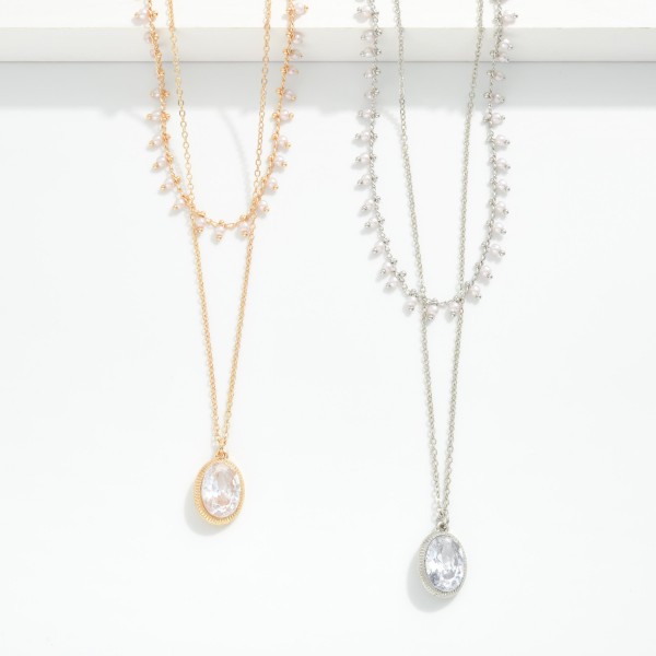 Layered Chain Link Necklace Featuring Pearls & Rhinestone Pendent  

- Approximately 18" L
- Extender 2" L

