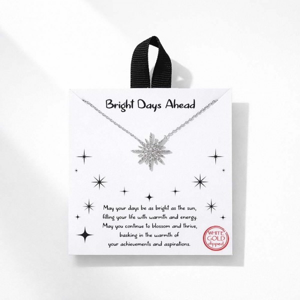 Dainty Chain Link Necklace Featuring Cubic Zirconia Sun Pendant 					
					
- Approximately 16" L					
- Extender 2" L					
- Hypoallergenic Brass Base					
- 18K Gold Dipped					
- Card: "May your days be as bright as the sun, filling your life with warmth and energy. May you continue to blossom and thrive, basking in the warmth of your achievements and aspirations."					