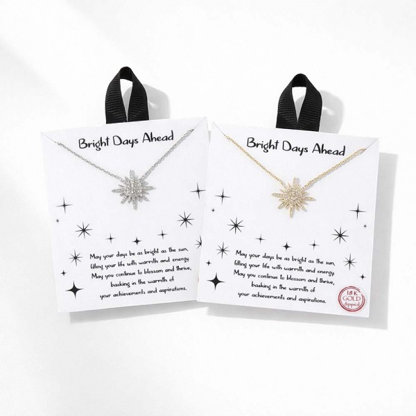 Dainty Chain Link Necklace Featuring Cubic Zirconia Sun Pendant 					
					
- Approximately 16" L					
- Extender 2" L					
- Hypoallergenic Brass Base					
- 18K Gold Dipped					
- Card: "May your days be as bright as the sun, filling your life with warmth and energy. May you continue to blossom and thrive, basking in the warmth of your achievements and aspirations."					