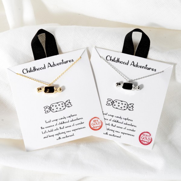 Dainty Chain Link Necklace Featuring Metal Tone Candy Pendant			
					
- Approximately 16" L					
- Extender 2" L					
- Hypoallergenic Brass Base					
- 18K Gold Dipped					
- Card: "Twist wrap candy captures the essence of childhood adventures. Let's hold onto the sense of wonder and keep exploring new experiences with excitement."					