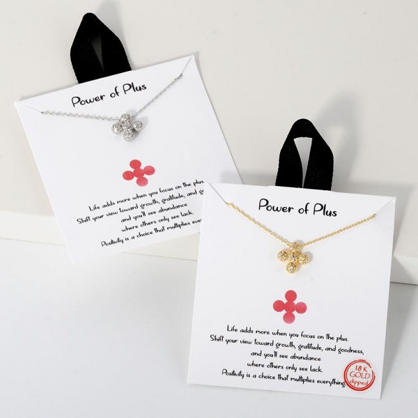 Dainty Chain Link Necklace Featuring Cubic Zirconia Bubble Plus Cross					
					
- Approximately 16" L					
- Extender 2" L					
- Hypoallergenic Brass Base					
- 18K Gold Dipped					
- Card: "Life adds more when you focus on the plus. Shift your view toward growth, gratitude, and goodness, and you'll see abundance where others only see lack. Positivity is a choice that multiplies everything."					