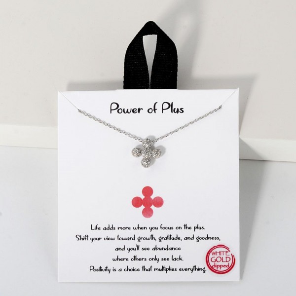 Dainty Chain Link Necklace Featuring Cubic Zirconia Bubble Plus Cross					
					
- Approximately 16" L					
- Extender 2" L					
- Hypoallergenic Brass Base					
- 18K Gold Dipped					
- Card: "Life adds more when you focus on the plus. Shift your view toward growth, gratitude, and goodness, and you'll see abundance where others only see lack. Positivity is a choice that multiplies everything."					