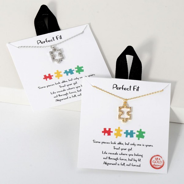 Dainty Chain Link Necklace Featuring Cubic Zirconia Puzzle Piece Pendant 		
					
- Approximately 16" L					
- Extender 2" L					
- Hypoallergenic Brass Base					
- 18K Gold Dipped					
- Card: "Some pieces look alike, but only on is yours. Trust your gut. Life reveals where you belong not through force, but by fit. Alignment is felt, not forced."		