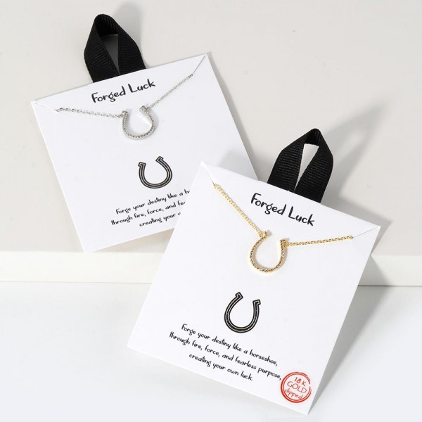 Dainty Chain Link Necklace Featuring Cubic Zirconia Horseshoe Pedant 				
					
- Approximately 16" L					
- Extender 2" L					
- Hypoallergenic Brass Base					
- 18K Gold Dipped					
- Card: "Forge your destiny like a horseshoe, through fire, force, and fearless purpose, creating your own luck."